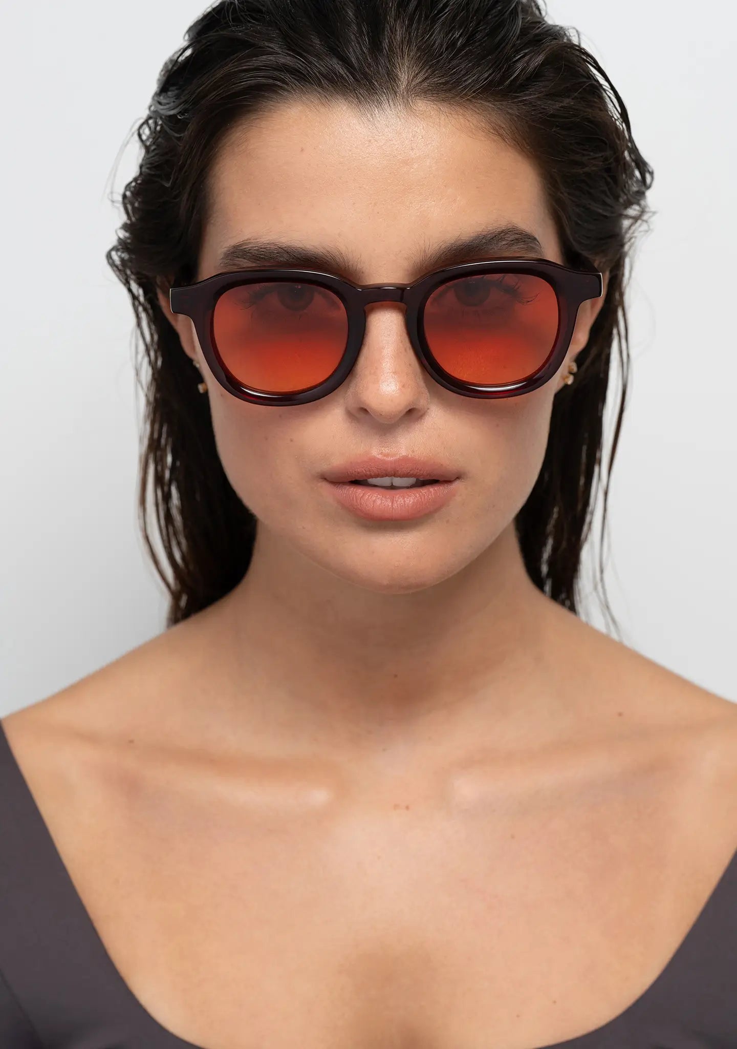 womens sunglasses Bo Bo Noir Narr panto round in deep burgundy acetate with gradient sunset red nylon lenses, woman wearing, front view.