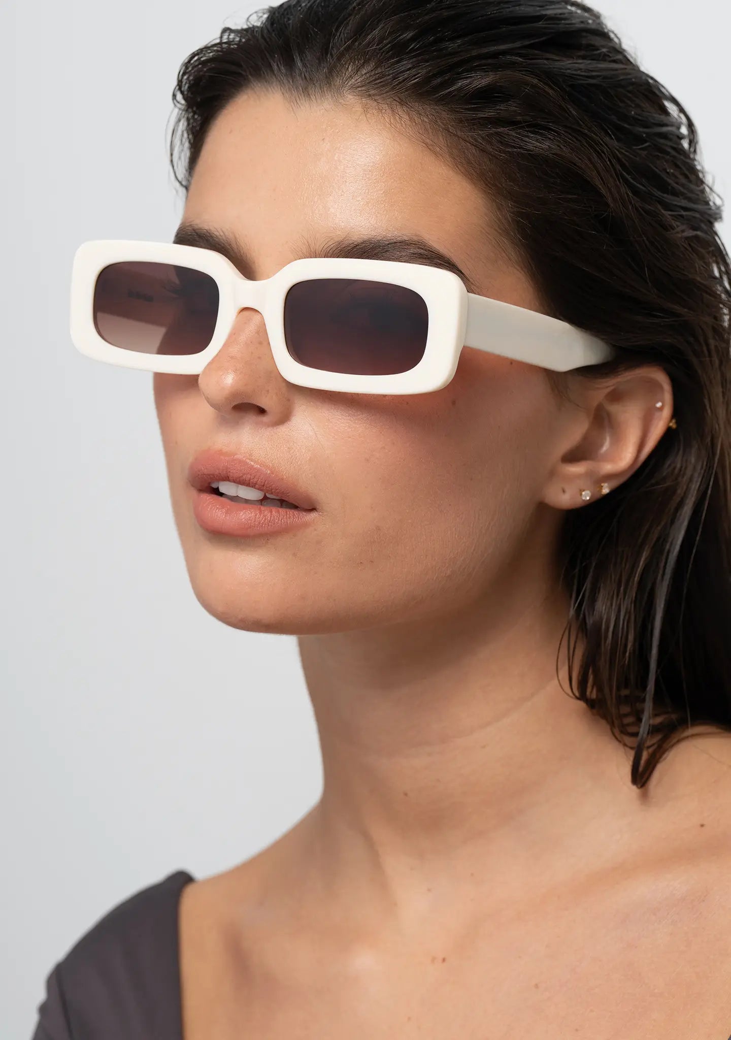 Bo Bo Noir Jane cream white rectangular womens sunglasses, woman wearing, side view.