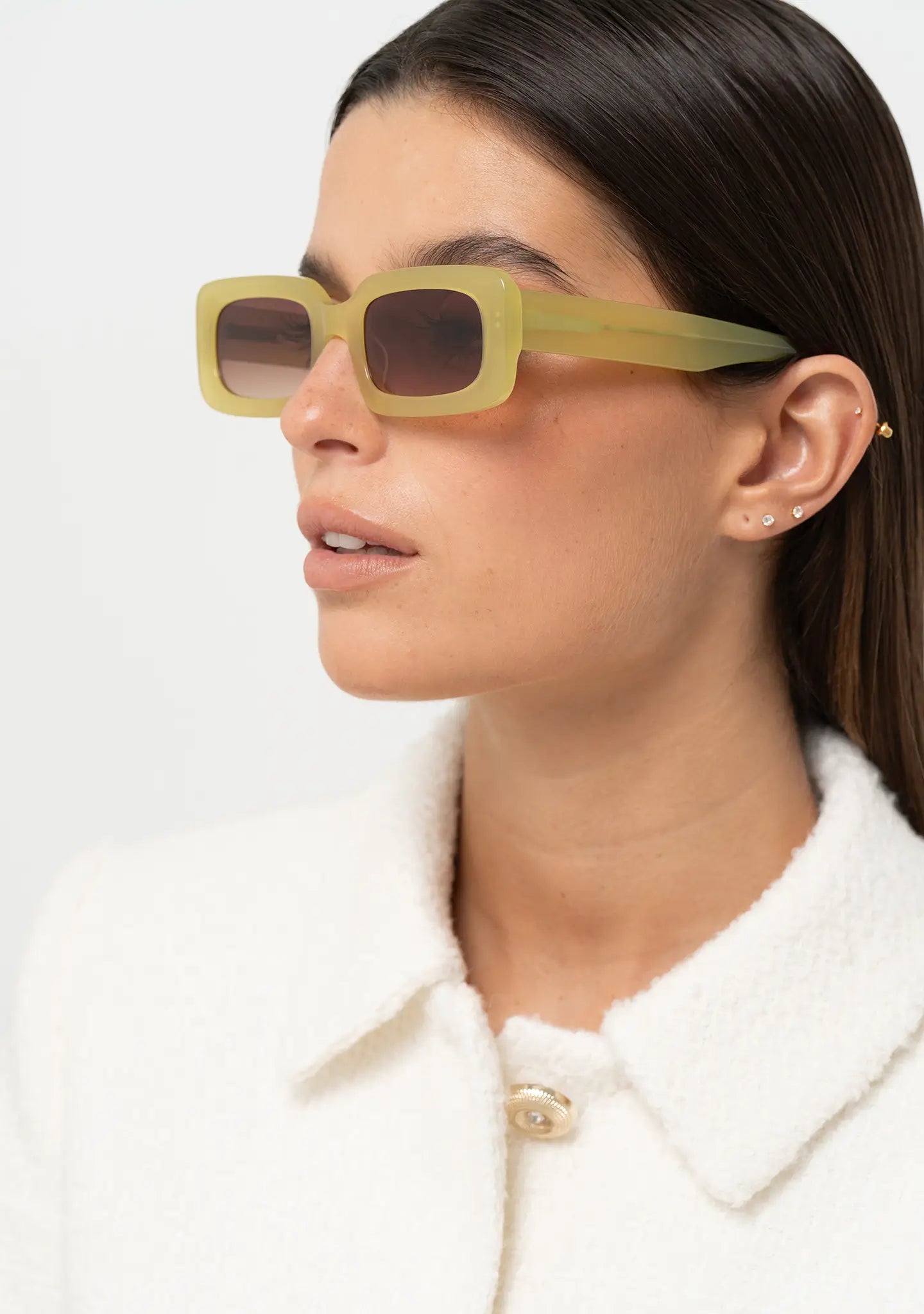 Bo Bo Noir Jane olive green rectangular womens sunglasses, woman wearing, side view.