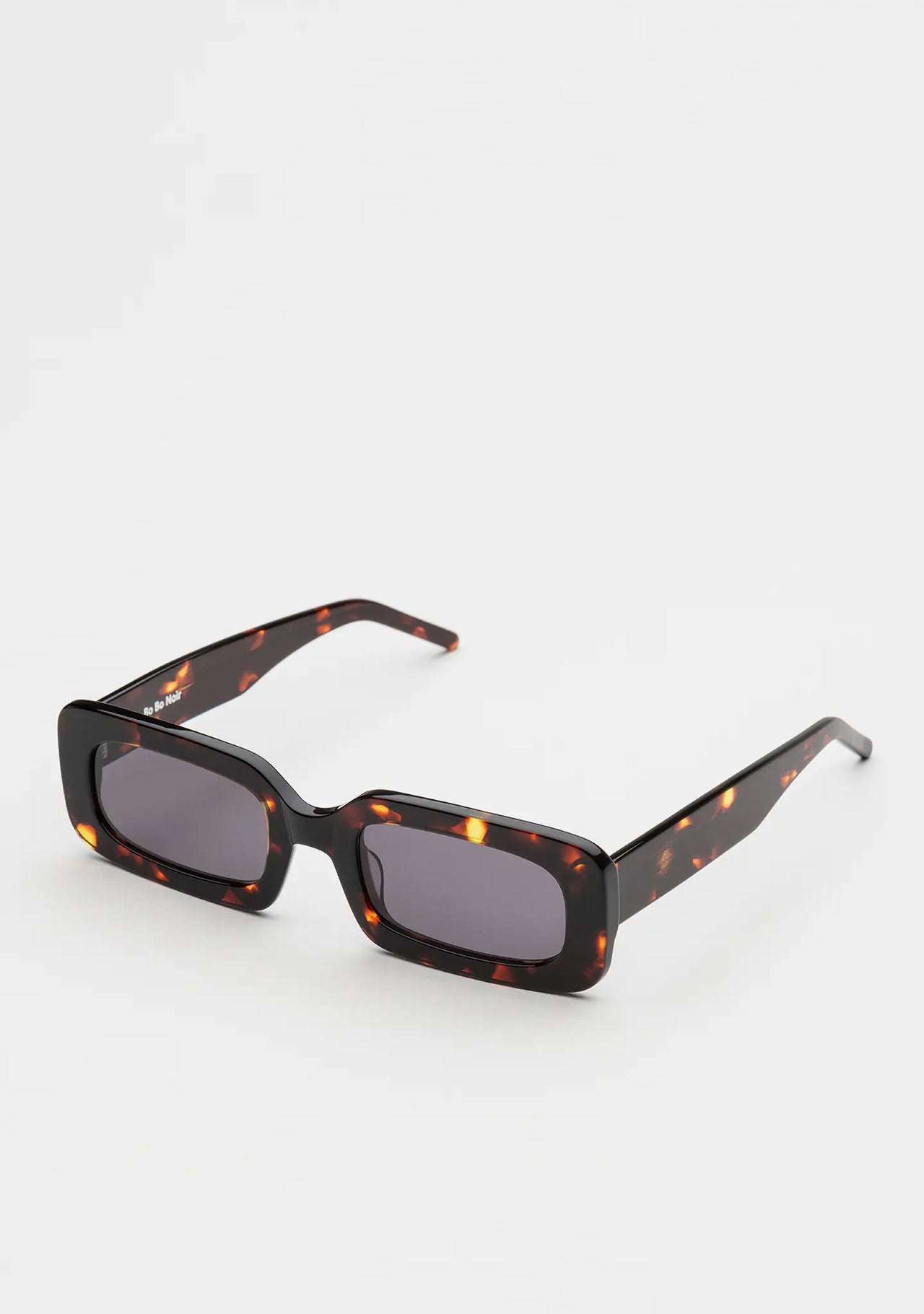 Bo Bo Noir Jane rectangular sunglasses in tortoise acetate with CR-39 single gray lenses, 45-degree view.