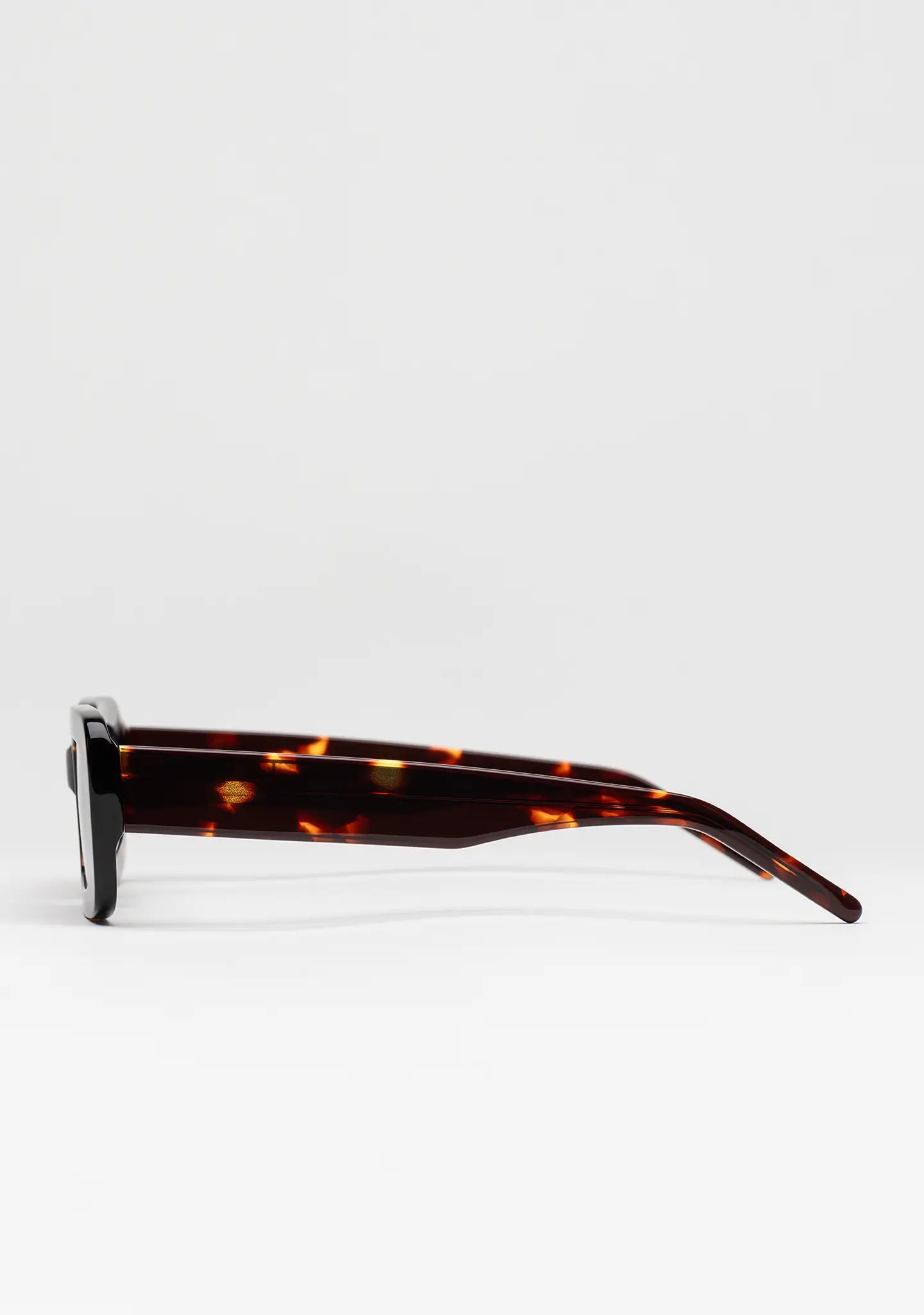 Bo Bo Noir Jane rectangular sunglasses in tortoise acetate, side view.