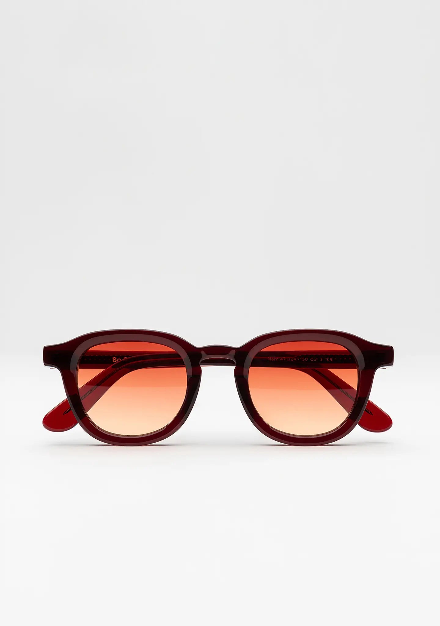 Bo Bo Noir Narr panto round sunglasses in deep burgundy acetate with gradient sunset red nylon lenses, front view.