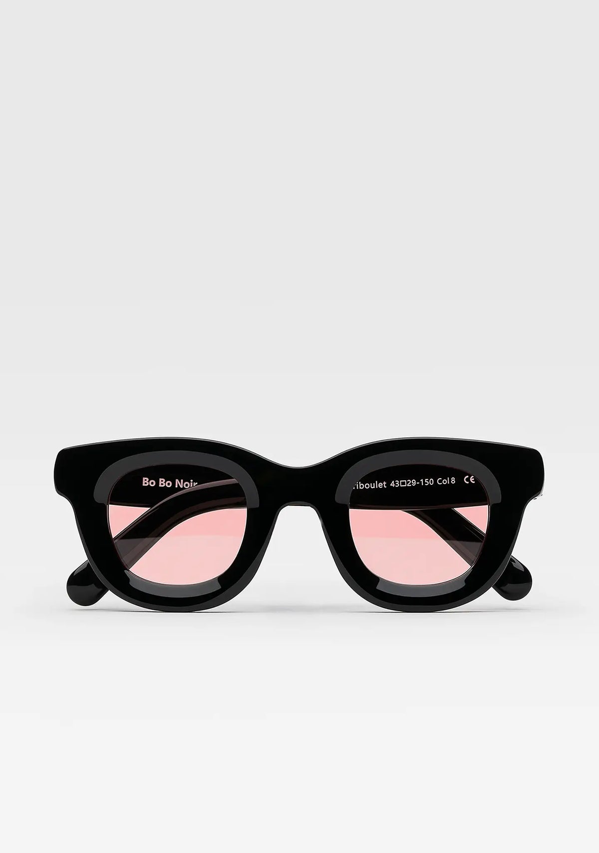Triboulet panto sunglasses with shiny black acetate frame and pink lenses, front view