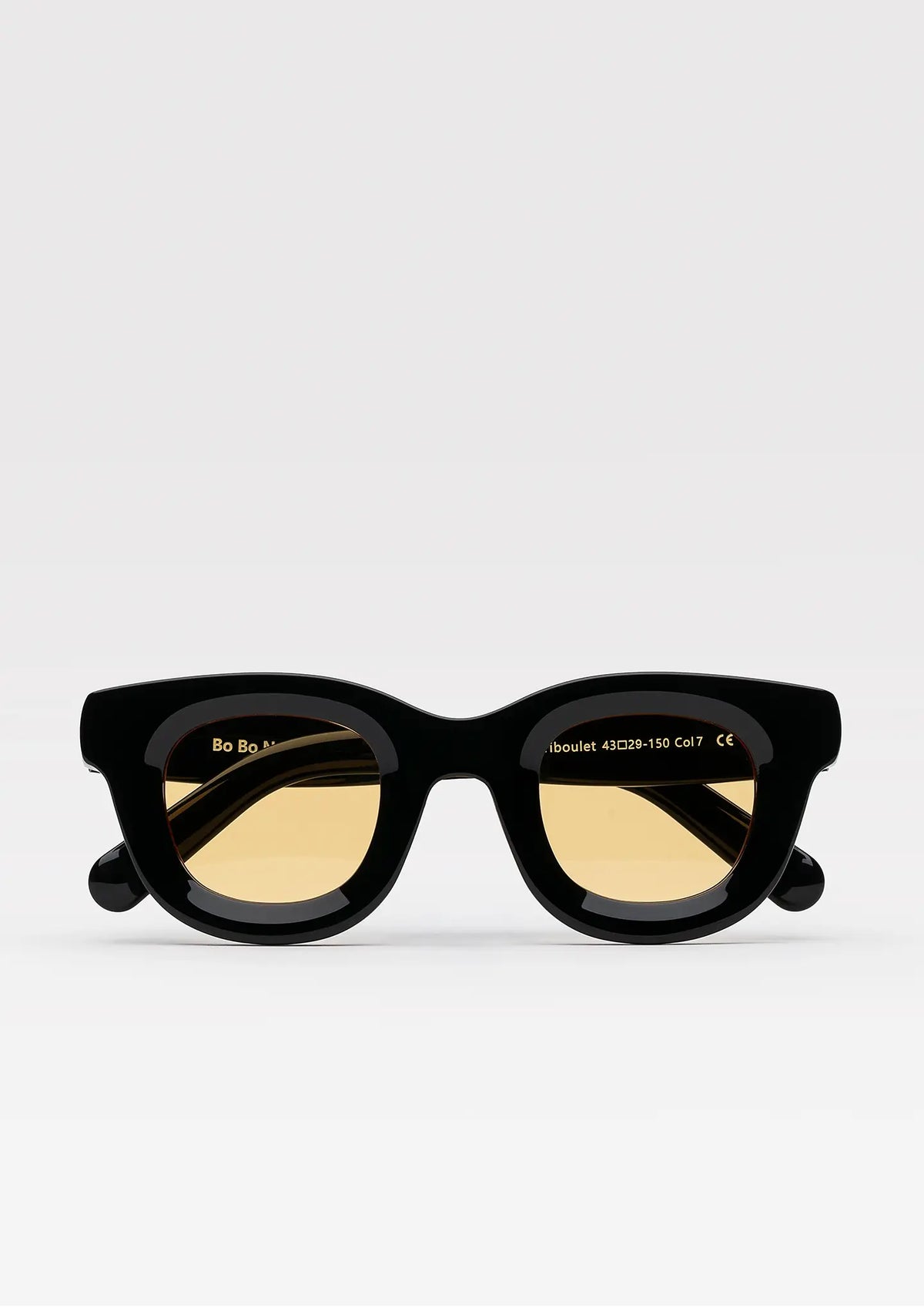 Triboulet panto sunglasses with shiny black acetate frame and yellow lenses, front view