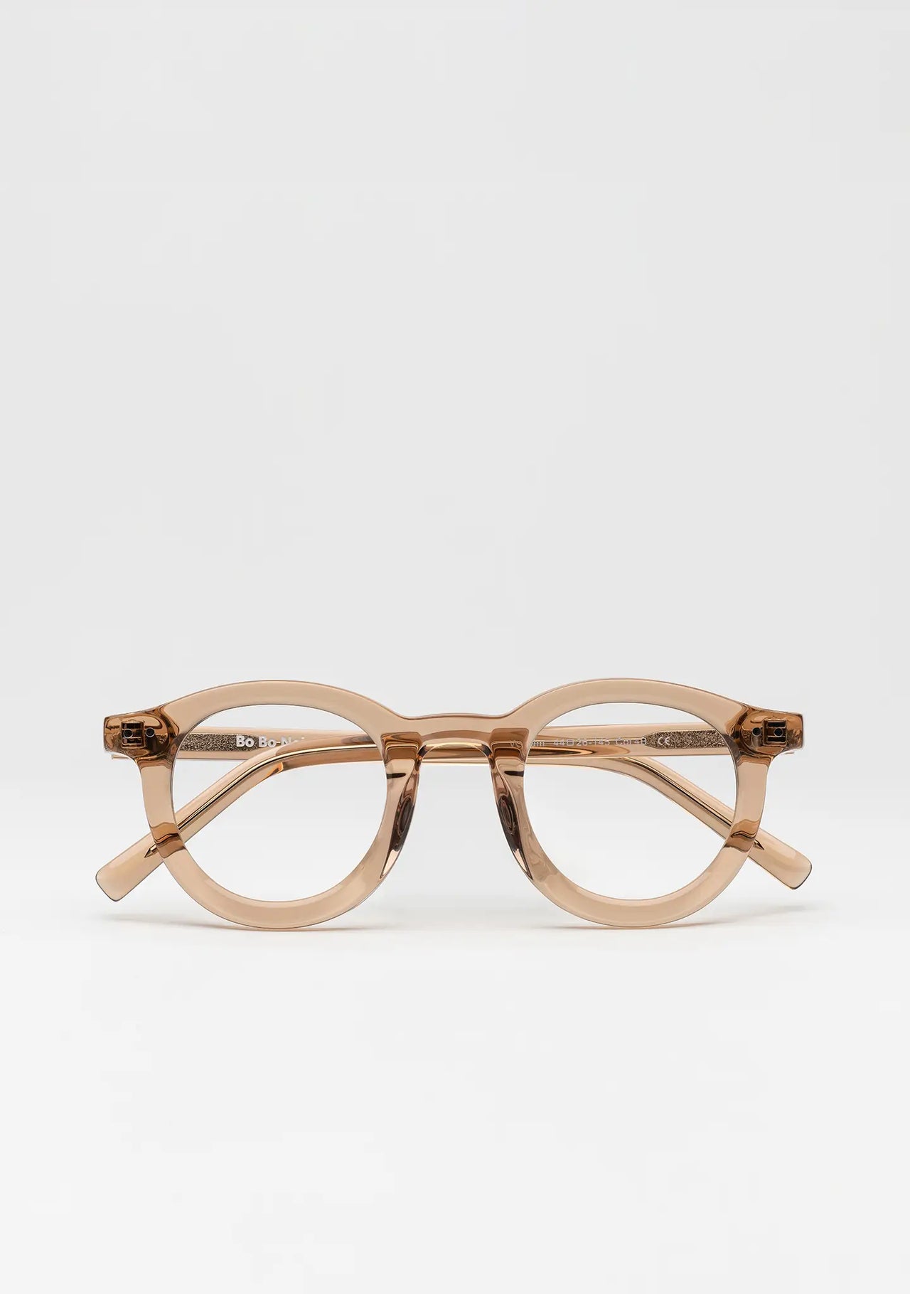 Bo Bo Noir William bold round optical frame in crystal peach acetate, front view.