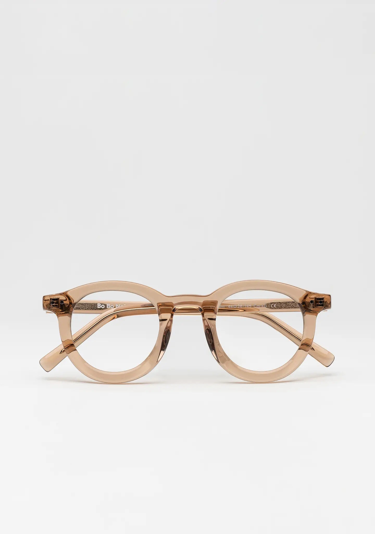 Bo Bo Noir William bold round optical frame in crystal peach acetate, front view.