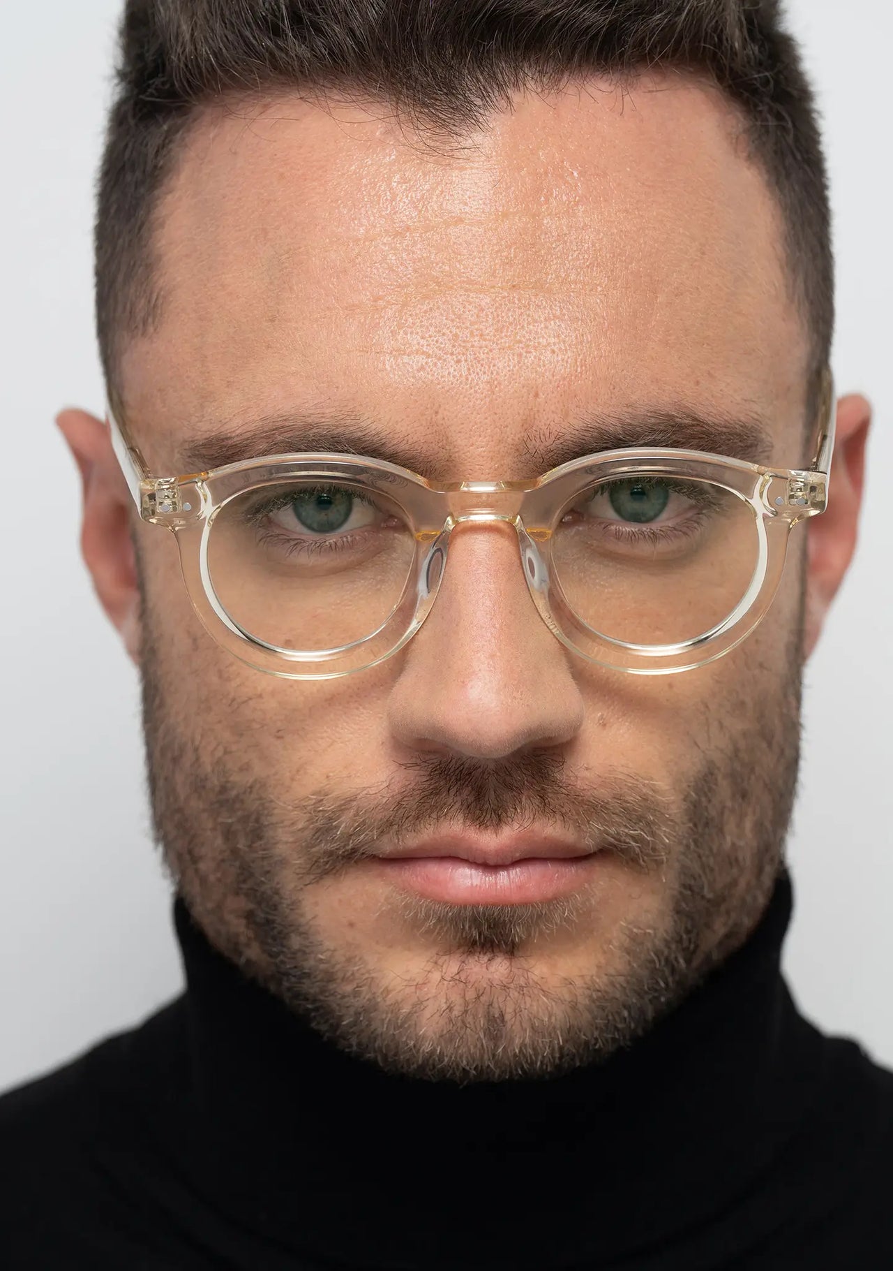 mens optical frame Bo Bo Noir William bold round in crystal yellow acetate, man wearing, front view.