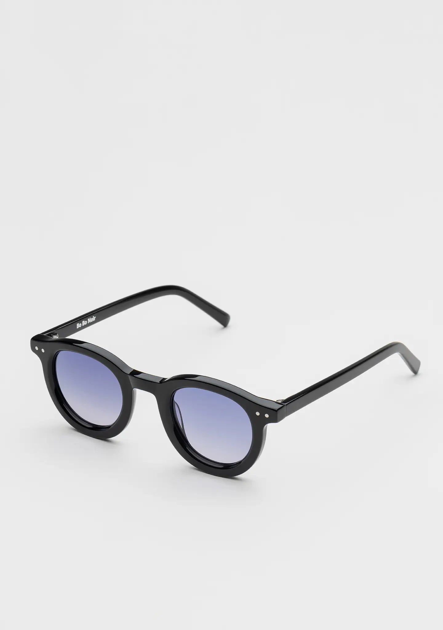 Bo Bo Noir William round sunglasses in shiny black acetate with CR-39 gradient blue lenses, 45-degree view.