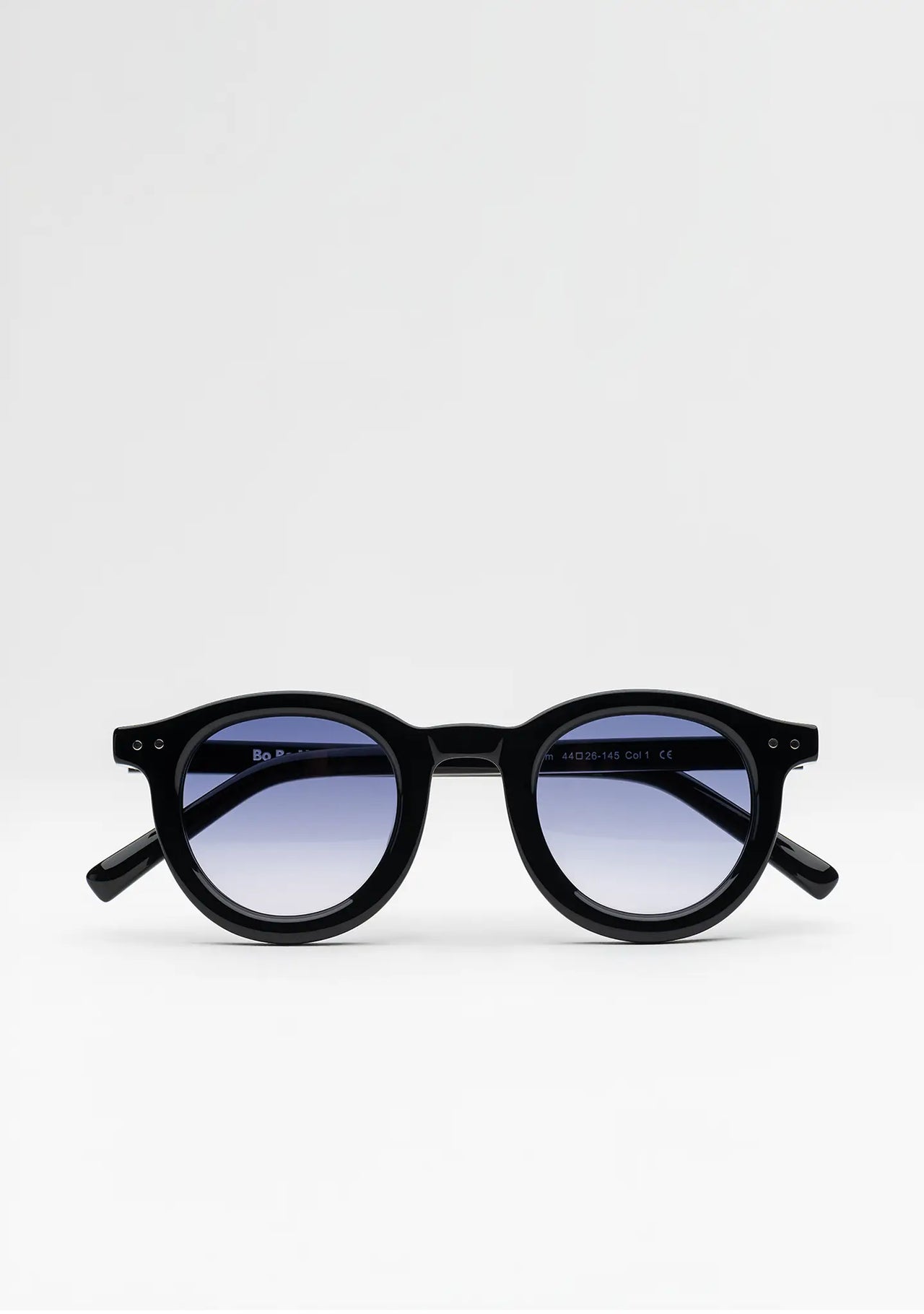 Bo Bo Noir William round sunglasses in shiny black acetate with CR-39 gradient blue lenses, front view.