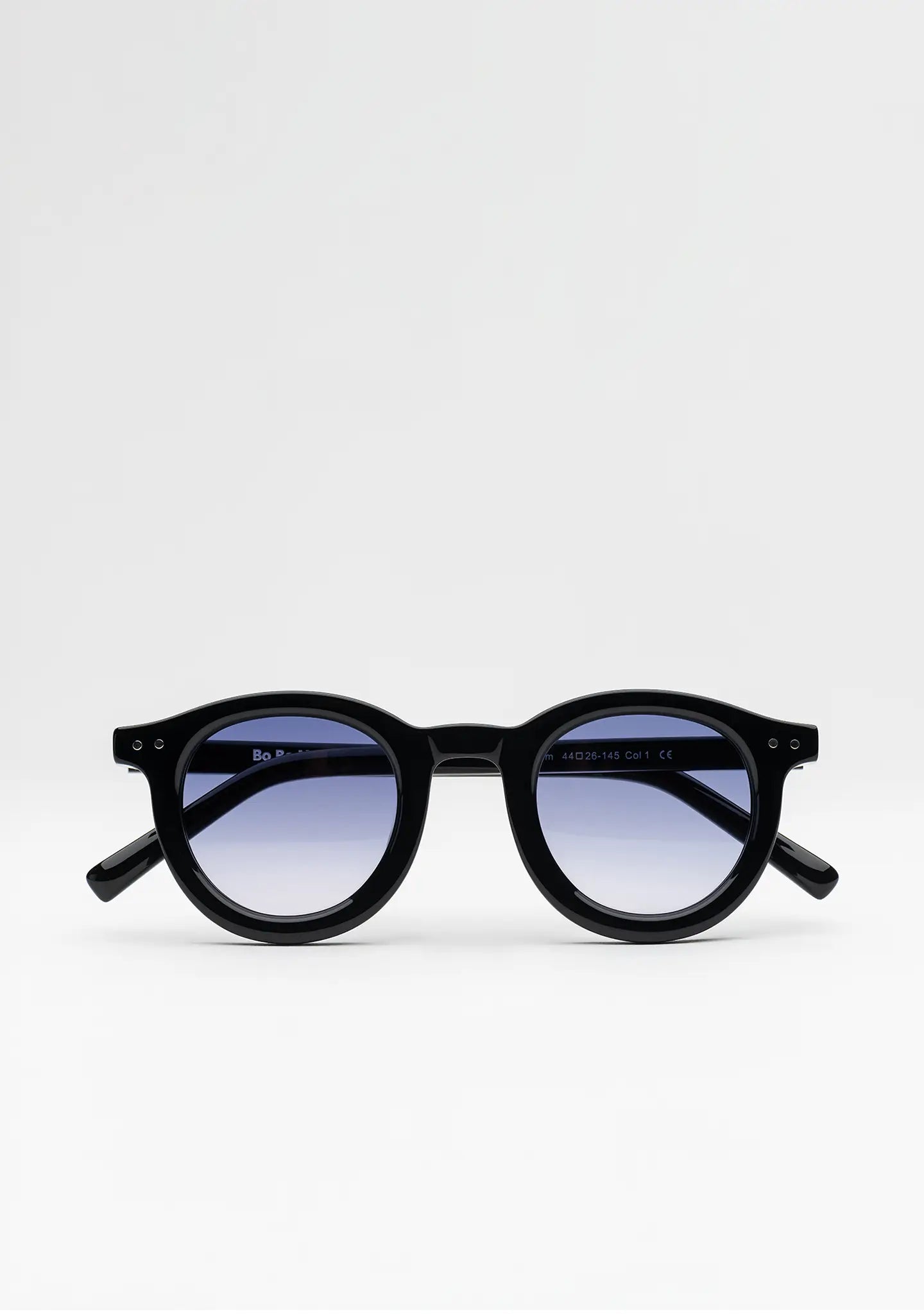 Bo Bo Noir William round sunglasses in shiny black acetate with CR-39 gradient blue lenses, front view.