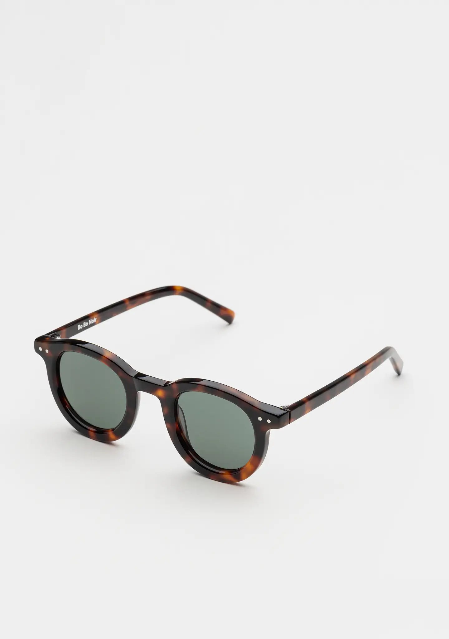 Bo Bo Noir William round sunglasses in tortoise acetate with single green lenses, 45-degree view.
