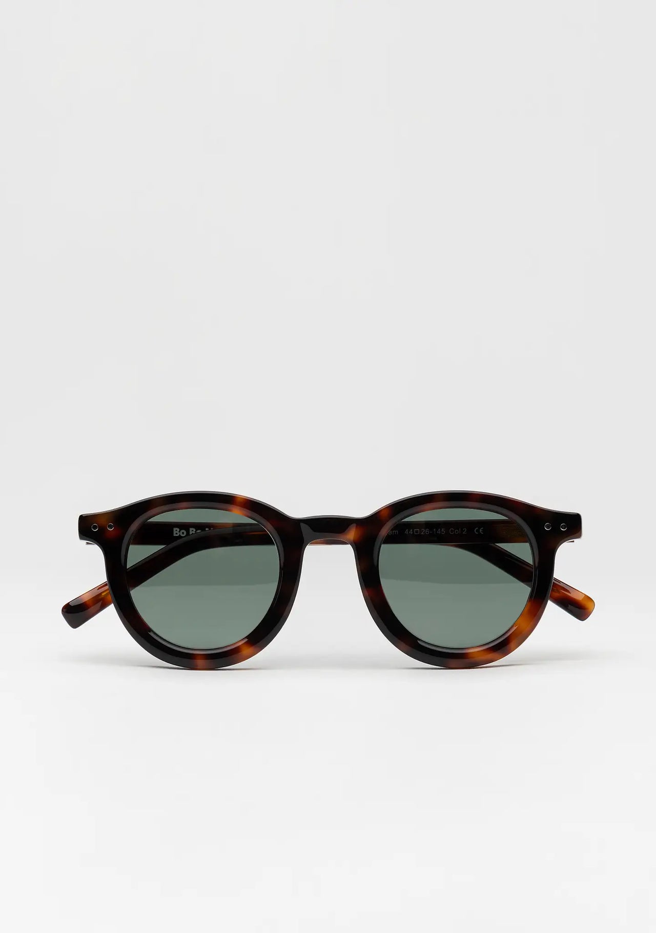 Bo Bo Noir William round sunglasses in tortoise acetate with single green lenses, front view.