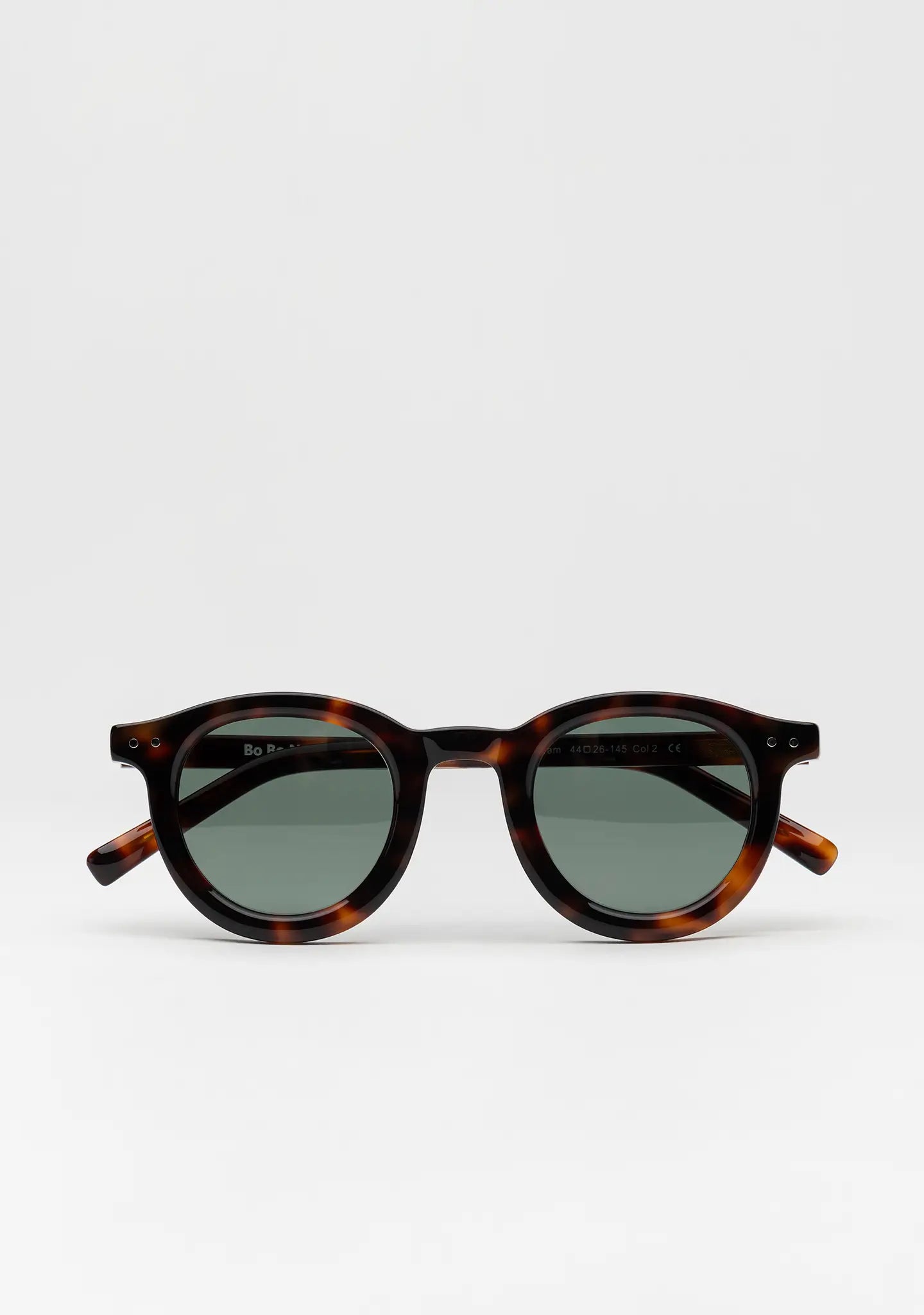 Bo Bo Noir William round sunglasses in tortoise acetate with single green lenses, front view.