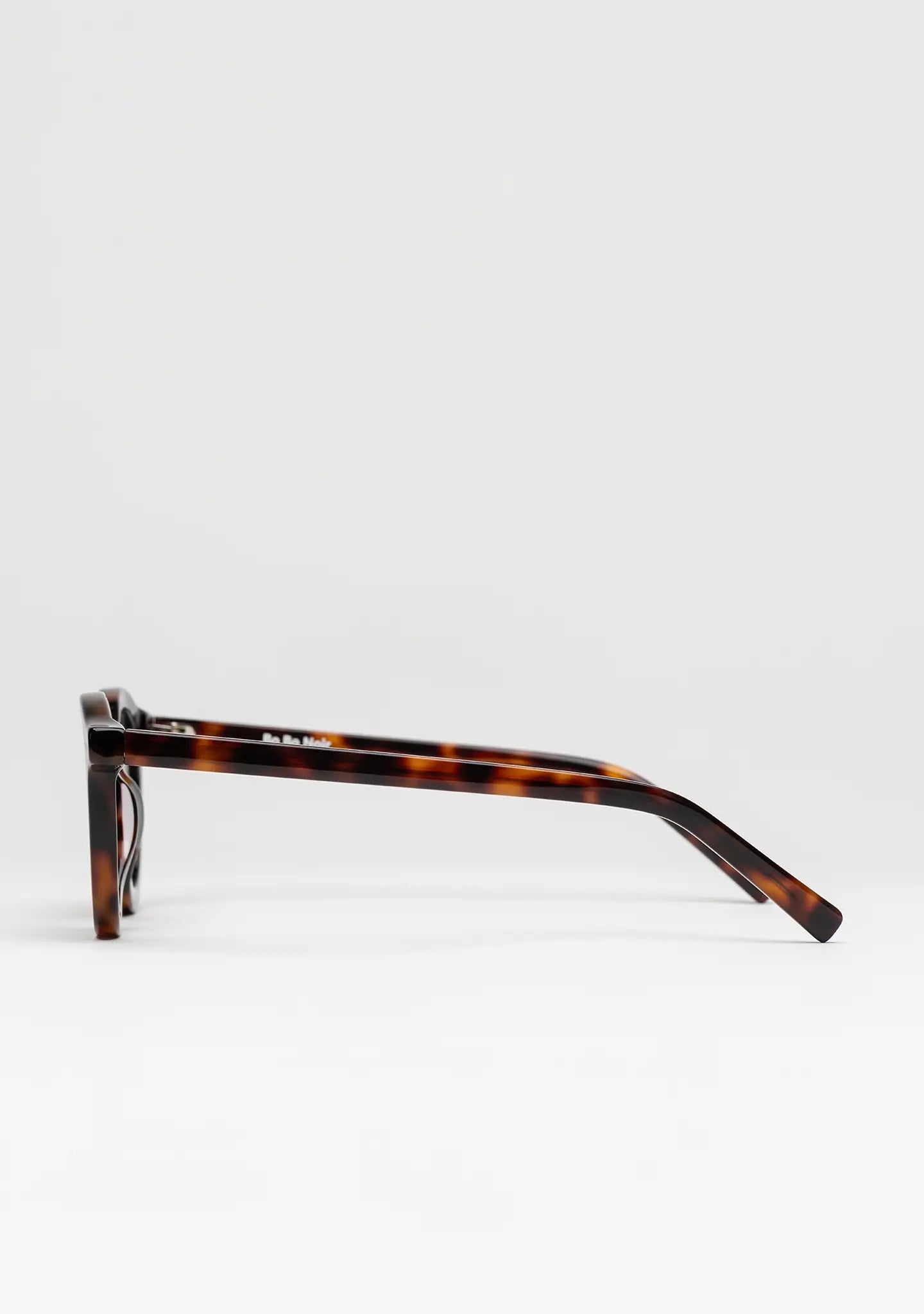 Bo Bo Noir William round sunglasses in tortoise acetate with single green lenses, side view.