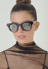womens Triboulet tortoise light blue panto sunglasses worn by a woman